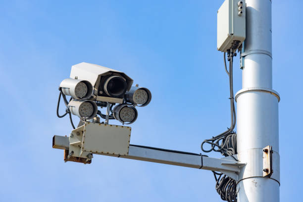 istock CCTV, Security road camera for traffic control on the street on blue sky 1418511080