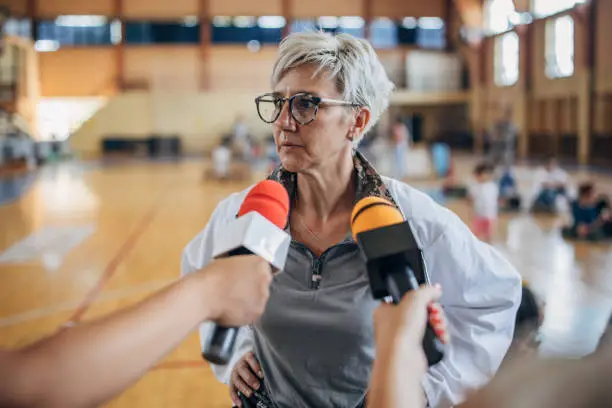 Photo of Press talking to a army doctor