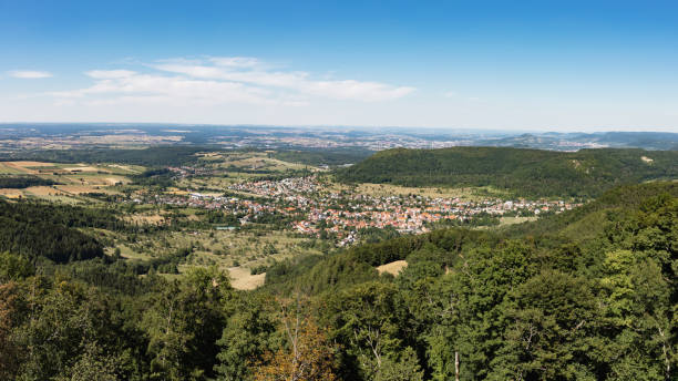 Rossberg Swabian Alb View in Summer Panorama Baden Württemberg Germany Swabian Alb in Summer. View from Rossberg Mountain down to the swabian village Gönningen. XXL Panorama Stiched Canon R5. Rossberg, Swabian Alb, Gönningen - Reutlingen, Baden Württemberg, Southwest Germany, Europe reutlingen photos stock pictures, royalty-free photos & images
