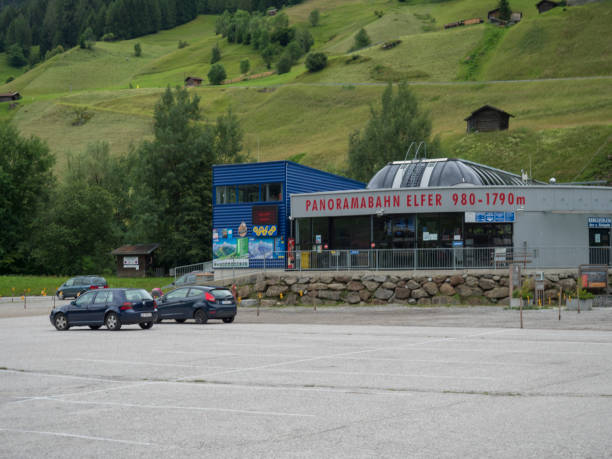 Frontal view of down station of Panoramabahn Elfer cable car and parking in Stubaital valley in Tyrol, Austria. Neustift im Stubaital, Austria, July 3, 2020: Frontal view of down station of Panoramabahn Elfer cable car and parking in Stubaital valley in Tyrol, Austria neustift im stubaital stock pictures, royalty-free photos & images