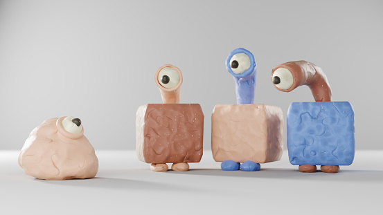 Funny characters made of plasticine looking at each other