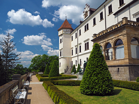 Honau - Reutlingen, Germany - September 30th, 2018: Done point of view Panorama over the Swabian Jura - Schwäbische Alb - with beautiful fairy-tale Castle Lichtenstein on top a steep rock on a sunny late summer day. Swabian Alb, Reutlingen, Baden Wurttemberg, Germany, Europe