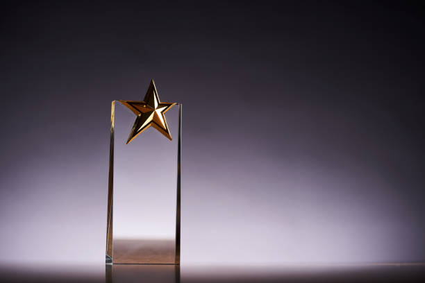 istock crystal trophy award against gray backgound 1418530157
