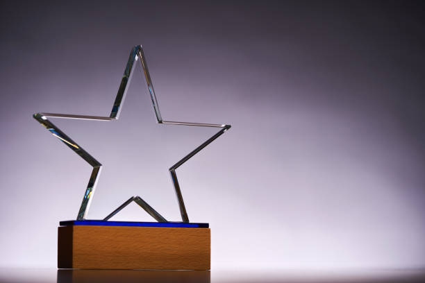 istock crystal trophy award against gray backgound 1418530180