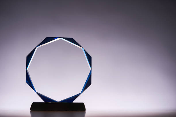 istock crystal trophy award against gray backgound 1418530214