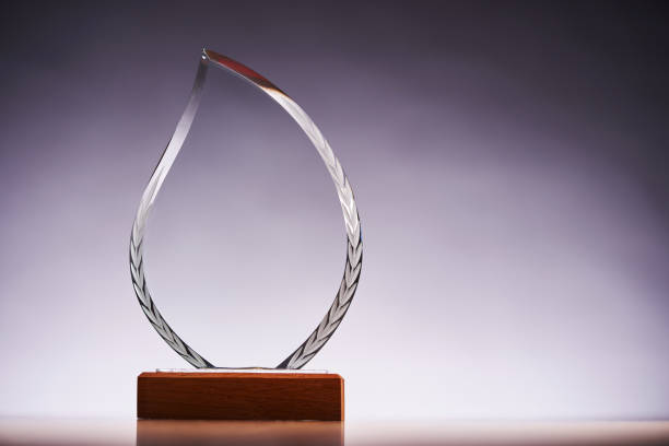 istock crystal trophy award against gray backgound 1418530221