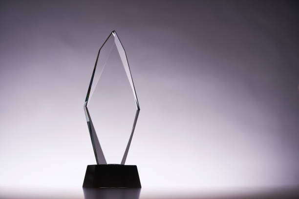istock crystal trophy award against gray backgound 1418530289