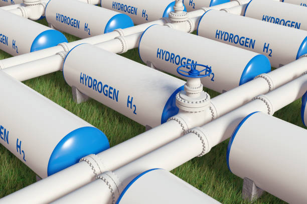 istock Hydrogen H2 gas storage tanks on green grass field 1418531083