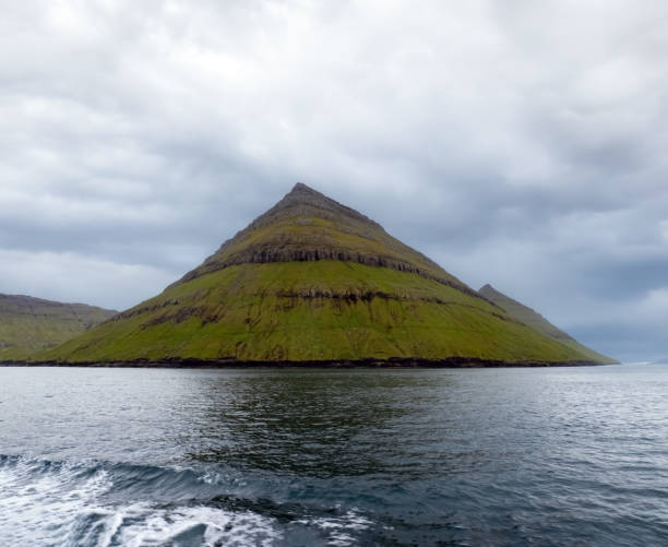 View of Kunoy island from the ferry between Klaksvik and Kalsoy Island, Faroe Islands (FÃ¸roya), Denmark. View of Kunoy island from the ferry between Klaksvik and Kalsoy Island, Faroe Islands (FÃ¸roya), Denmark. fã stock pictures, royalty-free photos & images