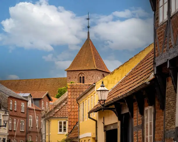 Photo of Street scenes in the historical town of Ribe, South West Jutland, Denmark. The oldest town in Denmark and in Scandinavia, established in the early eighth century in the Germanic Iron Age.