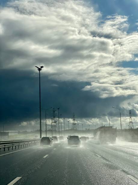 istock Traffic on a highway under sun and rain, Russia 1418535324
