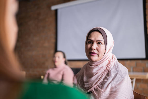 istock Colleagues talking in the classroom or workplace 1418536853