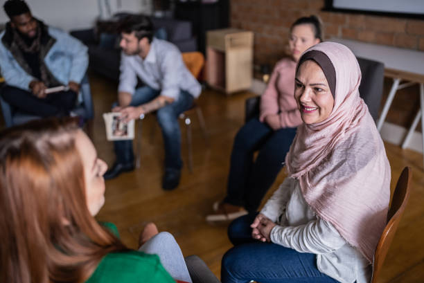 Colleagues talking in the classroom or workplace