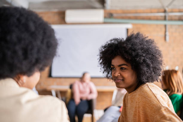 istock Colleagues talking in the classroom or workplace 1418536894