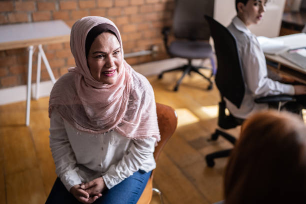 istock Colleagues talking in the classroom or workplace 1418536928