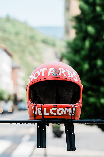 red motorcycle helmet. Motards welcome concept. High quality photo