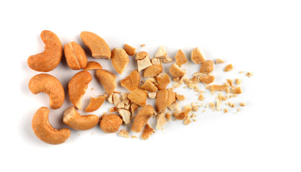 istock Set of roasted Cashew nuts isolated on white background. 1418544443