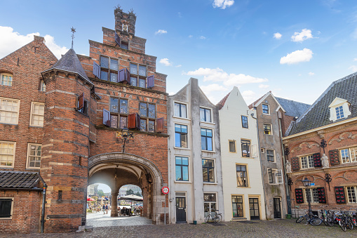 Nijmegen, Netherlands, September 19, 2021; Historic buildings with city gate in the center of Nijmegen.