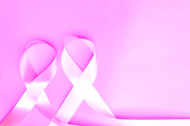 ruban de sensibilisation au cancer du sein, ruban rose, ruban blanc, lutte contre la violence à l’égard des femmes - breast cancer cancer breast cancer awareness ribbon pink photos et images de collection
