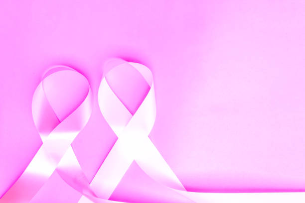 nastro di sensibilizzazione sul cancro al seno, nastro rosa, nastro bianco, lotta alla violenza contro le donne - breast cancer cancer breast cancer awareness ribbon pink foto e immagini stock