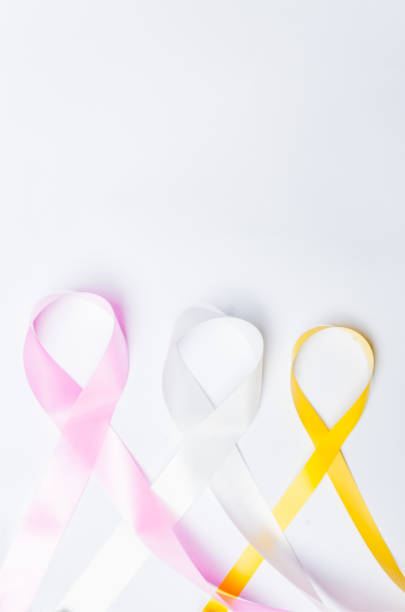 pink ribbon fights breast cancer, white ribbon, fights violence against women, yellow ribbon, fights suicide prevention pink ribbon fight against breast cancer, white ribbon, fight against violence against women, yellow ribbon, fight against suicide prevention, isolated on white background. amber alert ribbon stock pictures, royalty-free photos & images