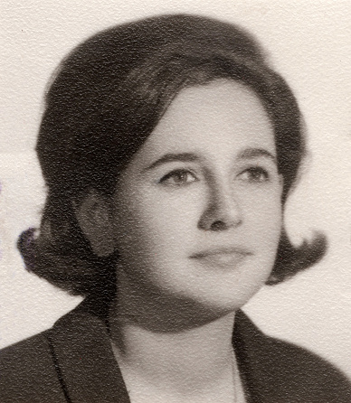 Black and White Vintage studio headshot from the 60s, young woman looking away