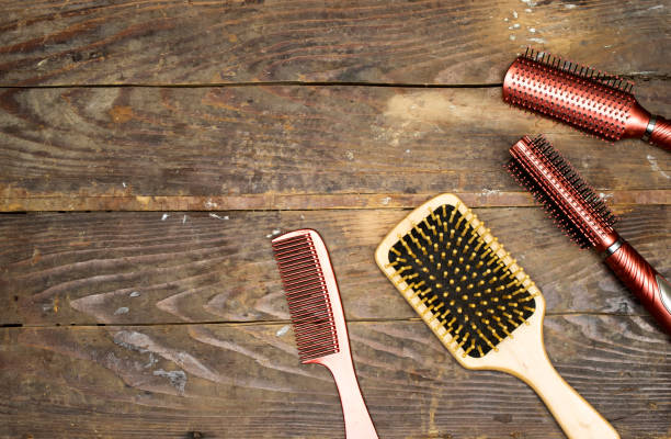 Set of hairbrushes on wood table, Professional combs. Space for the text