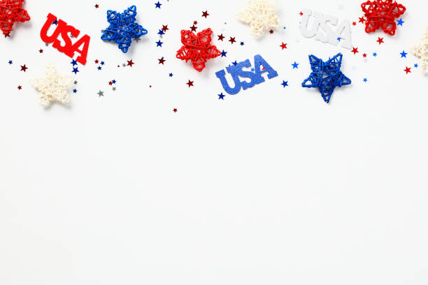 istock Red white and blue star and decorations USA with confetti on white background. Flat lay, top view. Happy Columbus Day, American Labor Day, Independence Day concept 1418568628