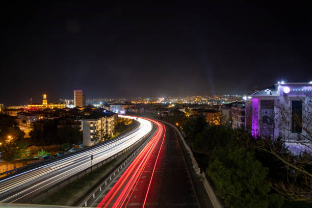 istock Long exposure shot shot at Night Road 1418574643