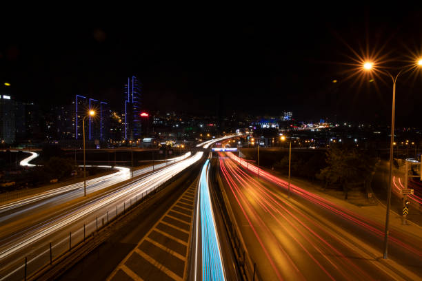 istock Long exposure shot shot at Night Road 1418574668