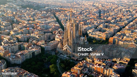 istock Barcelona Eixample residential district and famous Basilica Sagrada Familia at sunset. Catalonia, Spain 1418575808