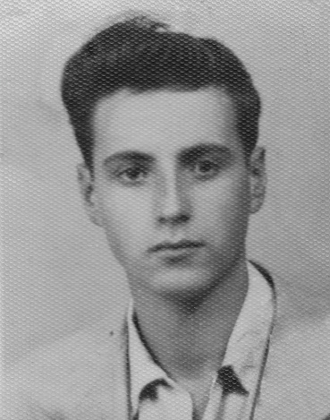 Black and White image taken in the 50s of a young man looking at the camera