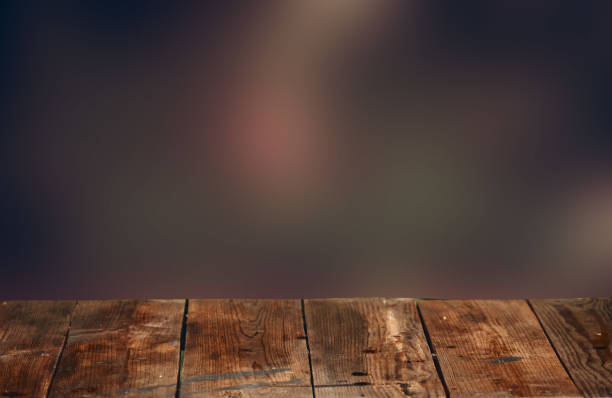 istock Wooden surface on the background of a blurred backdrop 1418601021