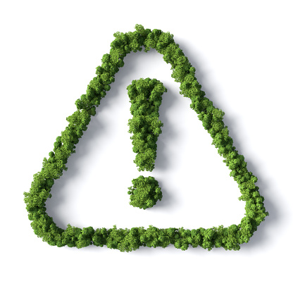 Green recycling symbol on brown creased paper background from a paper packaging. eco-friendly and save the world concept