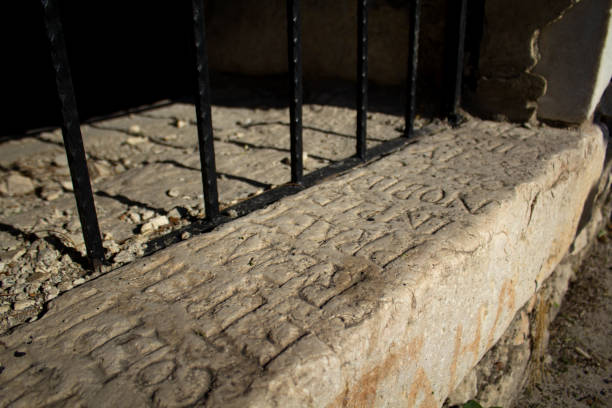 istock Ancient Rome writings carved in stone 1418612774