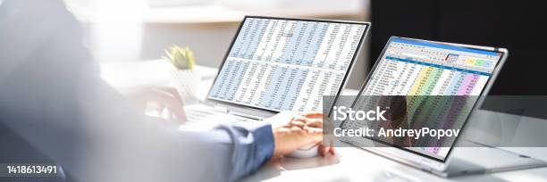 Analyst Working With Spreadsheet Business Data Stock Photo - Download Image Now - 30-34 Years, Adult, Adults Only