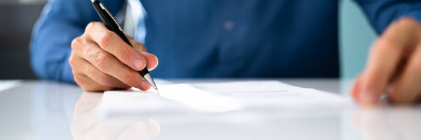istock Agreement Signature With Pen 1418613575