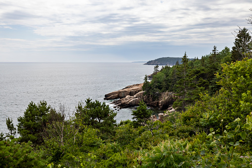 Tranquil scene near Thunder Hole in Acadia National Park in Bar Harbor, Maine. This carved out inlet is along the rocky eastern shoreline of Mount Desert Island.