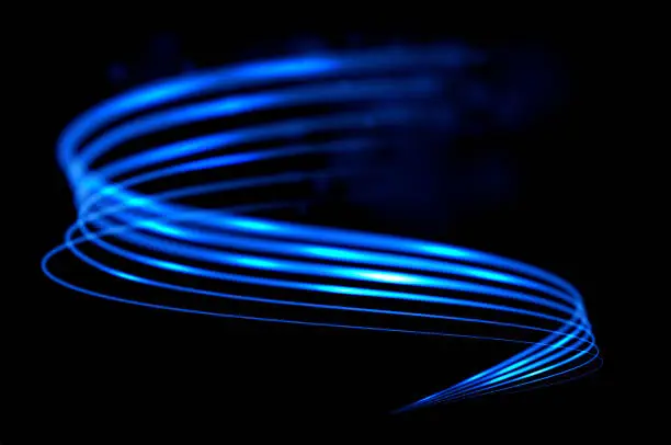 Vector illustration of Blue light trail. Effect of speed and movement. Vector shimmering wave