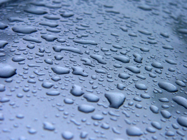 istock Close up abstract background of water rain drops 1418618052