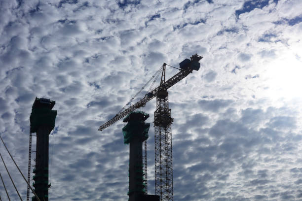 construction crane bottm view against sky for engineering industry concept
