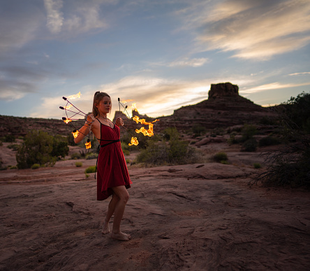 Fire dancer performing in the Utah desert - Moab