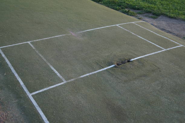 istock Cricket gear and pitch 1418639792
