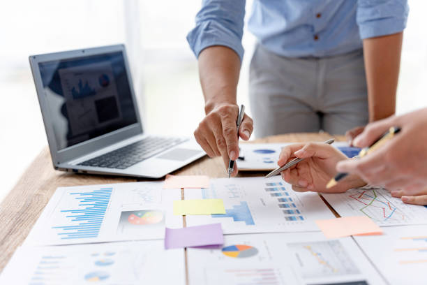 istock Group of business people brainstorm together to work presenting new ideas and projects. 1418650413