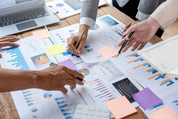 istock Group of business people brainstorm together to work presenting new ideas and projects. 1418650427