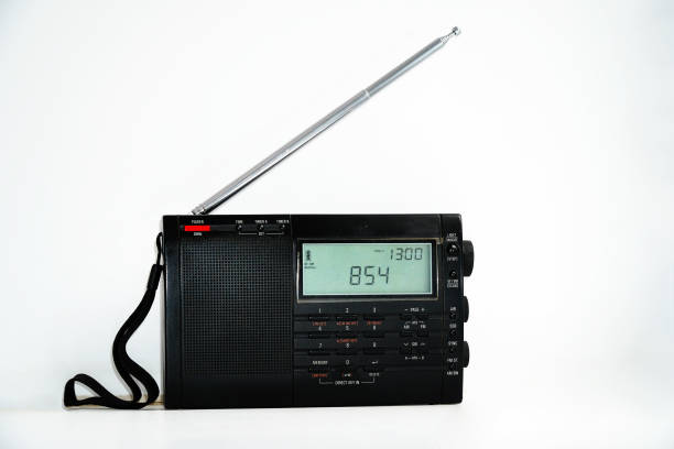 istock Modern black shortwave radio with antenna and digital display on white background 1418650504