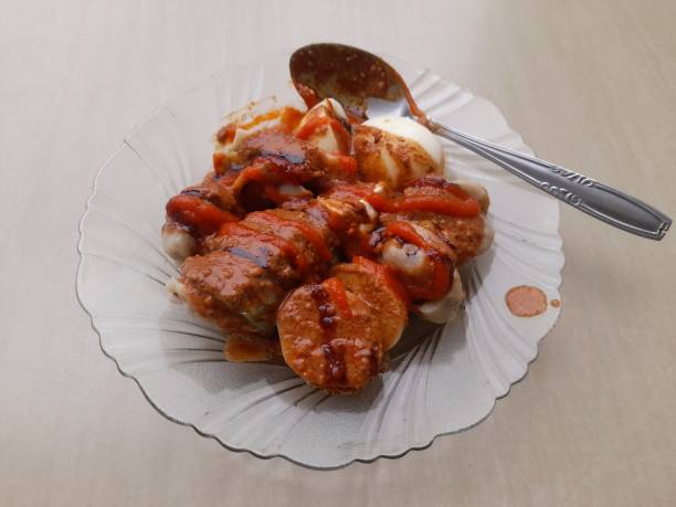 istock dumplings with peanut sauce on a plate 1418651073