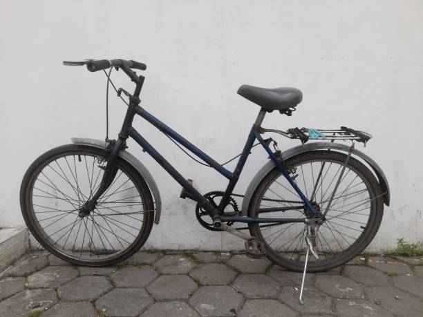 istock black lady bike side view 1418658768