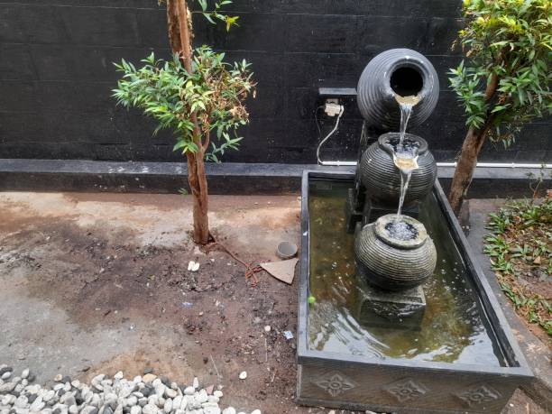 istock fountain design from a jar in the yard 1418659709