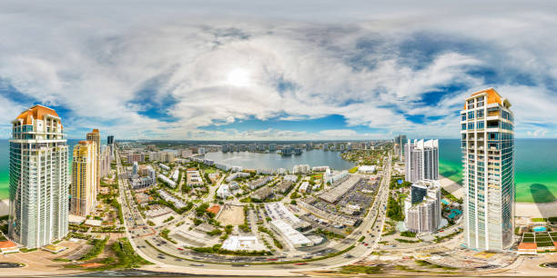istock Drone aerial 360 equirectangular photo Sunny Isles Beach condos and shopping centers 1418660570